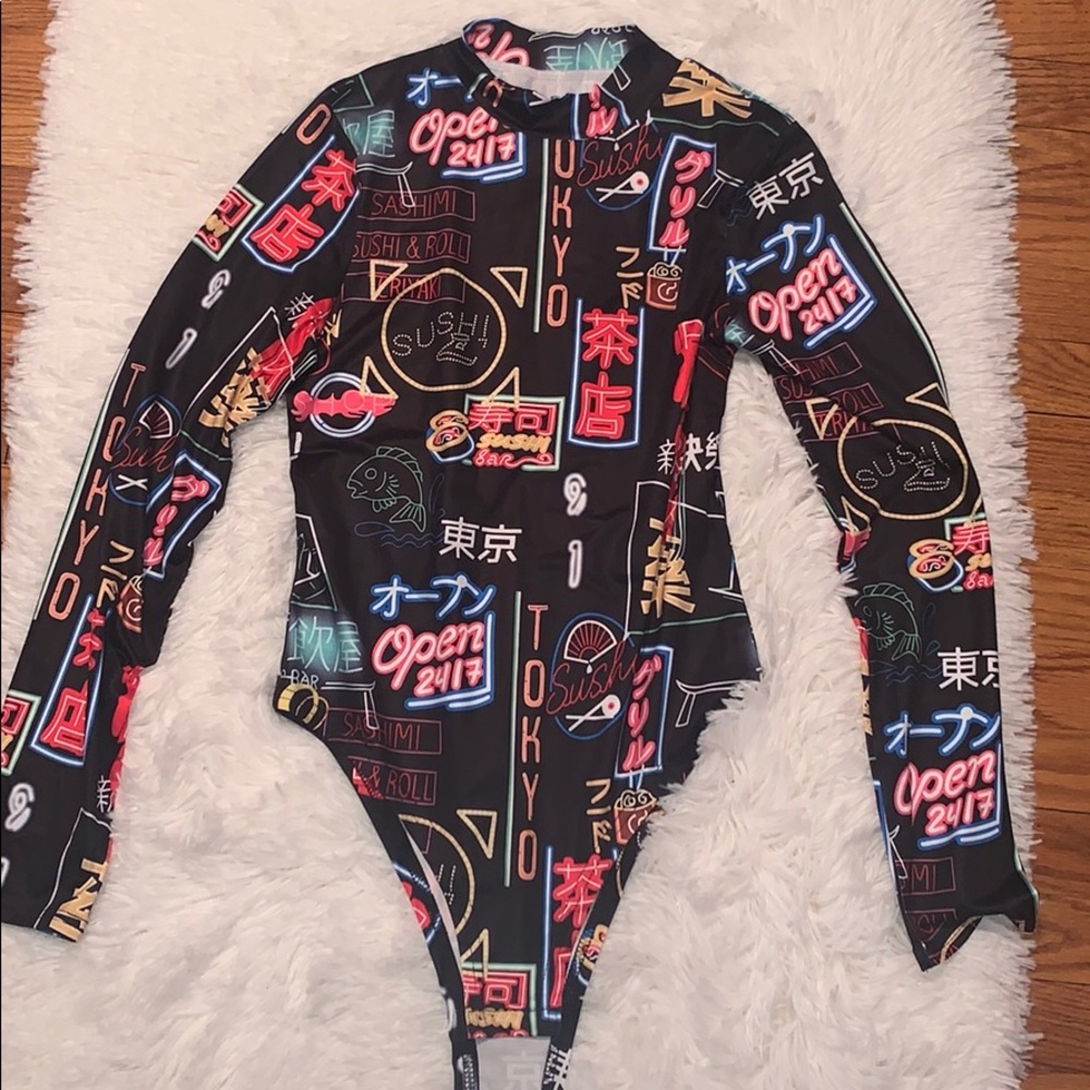 Black body suit with bright neon decor